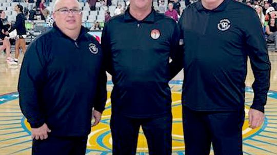 Coach Scott officiates at State