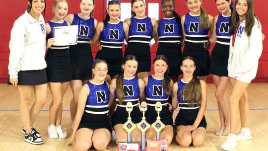 NHS Pom brings home awards from camp