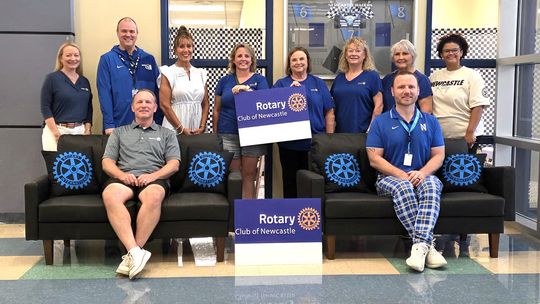 Rotarians donate 2 couches to NMS