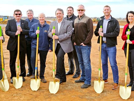 Bankers, builders turn ground for new FNB in Goldsby