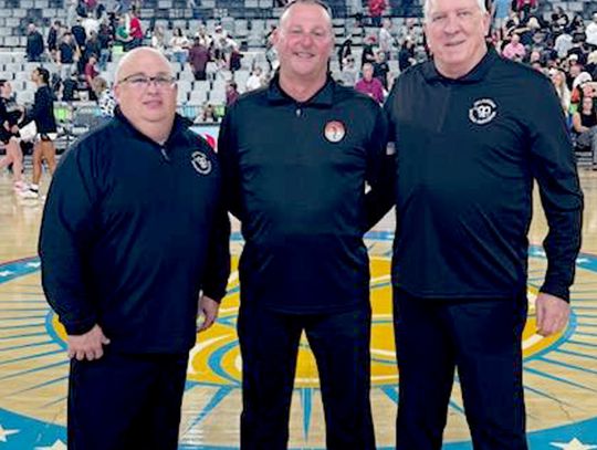 Coach Scott officiates at State