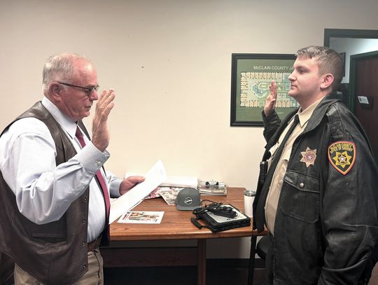 Lambert takes the oath as Deputy