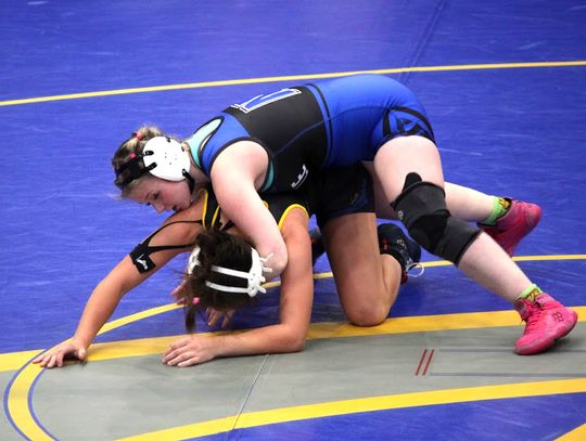 Newcastle Racer wrestlers are shown in action at the December 16 Piedmont Dual