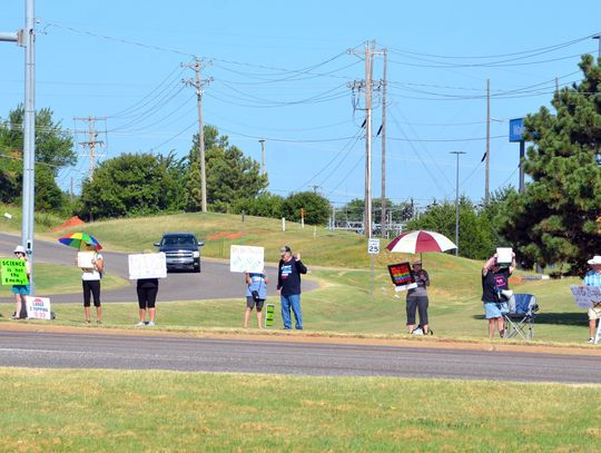 Protesters make statement as Congressman Cole visits Purcell