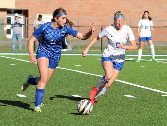 Racer girls undefeated until District play