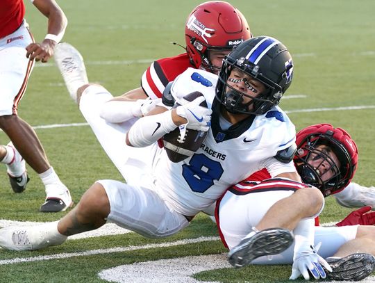 Racers win District opener