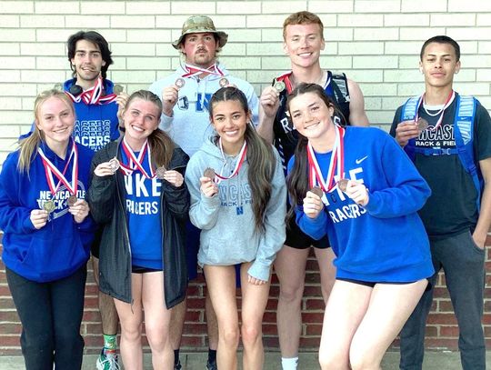 Several Newcastle High School athletes sport their track medals won at the Purcell Track and Field meet