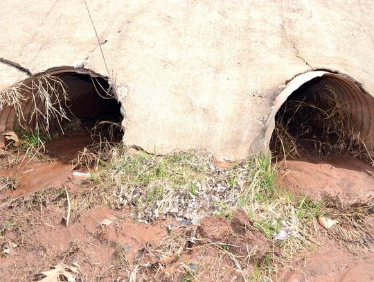 Siltation is shown coming out of culverts from drainage areas in Country Club Estates