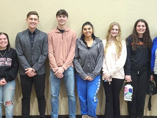 Student interns visit with school board