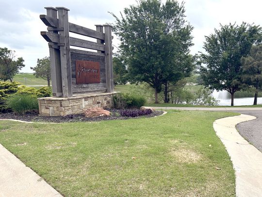 The manicured entrance to Riverview Estates housing