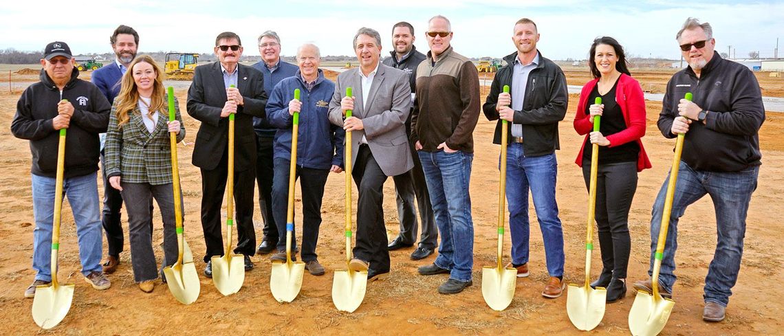 Bankers, builders turn ground for new FNB in Goldsby