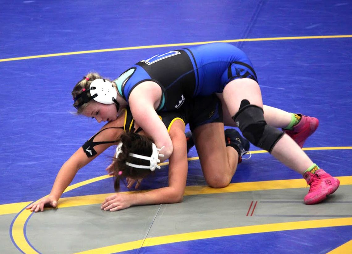 Newcastle Racer wrestlers are shown in action at the December 16 Piedmont Dual