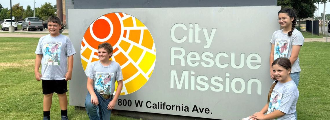 Oklahoma Kid Governor & cabinet volunteer at OKC Homeless Shelter
