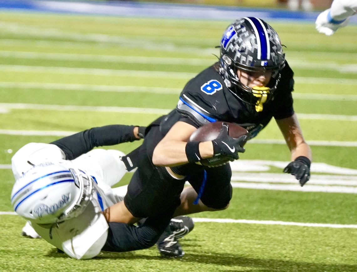 Racers overpower Tigers 38-37