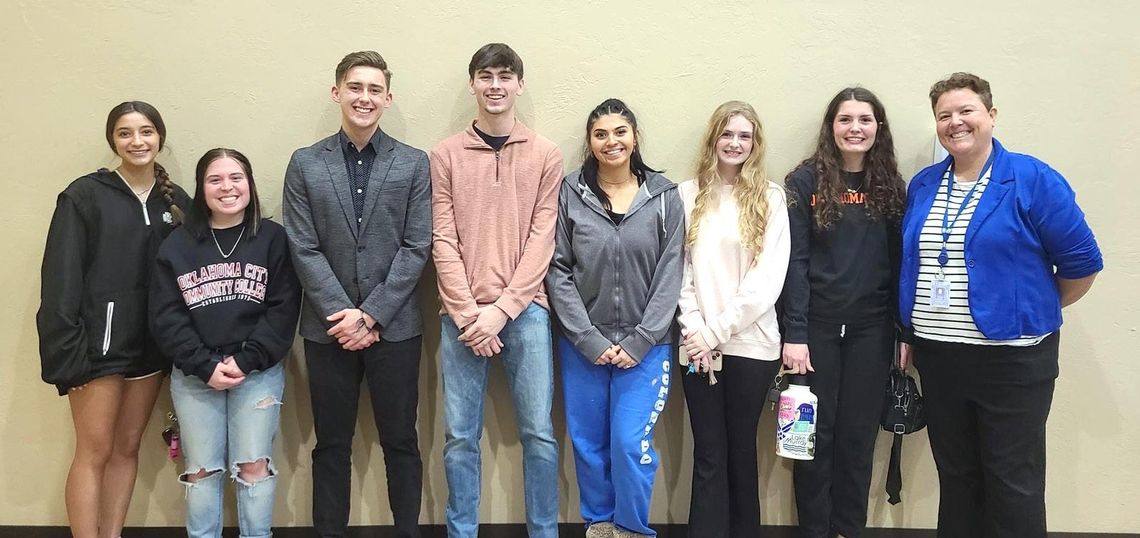 Student interns visit with school board