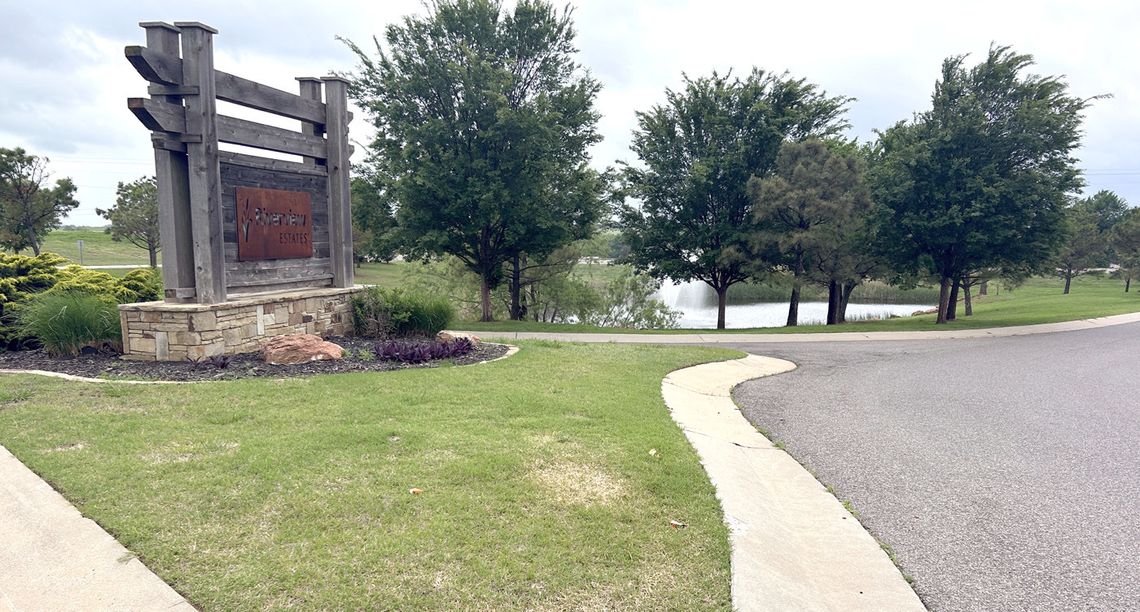 The manicured entrance to Riverview Estates housing
