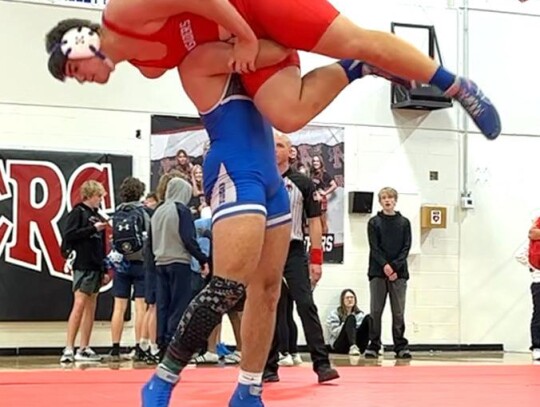 Randy Nix, Jr. tosses his opponent in a wrestling match at the Pauls Valley Tournament. • photo provided