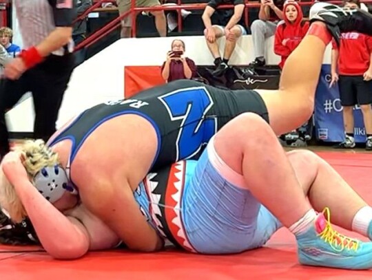 Nicolas Lozano takes his heavyweight opponent to the mat during the Pauls Valley Tournament. Lozano won second place. • photo provided