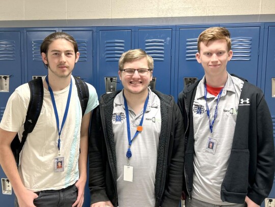 Senior students Riley Baldwin, Morgan Ennis and Jacob Lewis are interns at Nano Repairs in Newcastle. They fix phones, iPads, and computers. • photo by Mark Codner