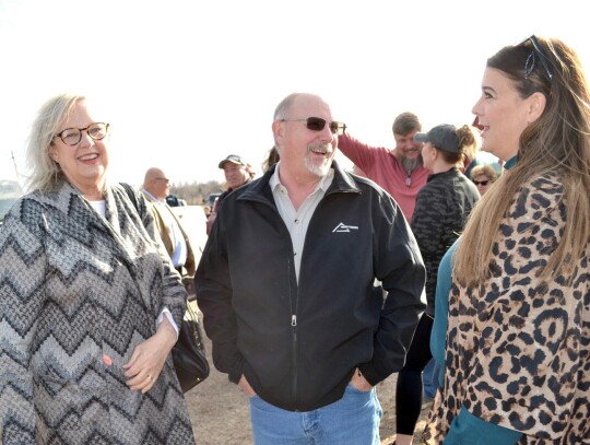 City Clerk Camille Dowers and Council members Mike Fullerton and Marci White enjoy a laugh while waiting to break ground on the City of Newcastle’s new Fire Station #1 on Main Street. • photo by Mark Codner