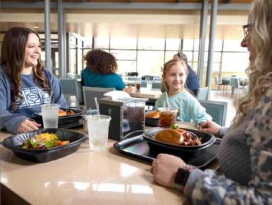 From left: Chickasaw Cultural Center visitors Alayna Benedict, Mattie Blalock and Shalane Blalock enjoy lunch from the newly-renovated Aaimpa' Café.