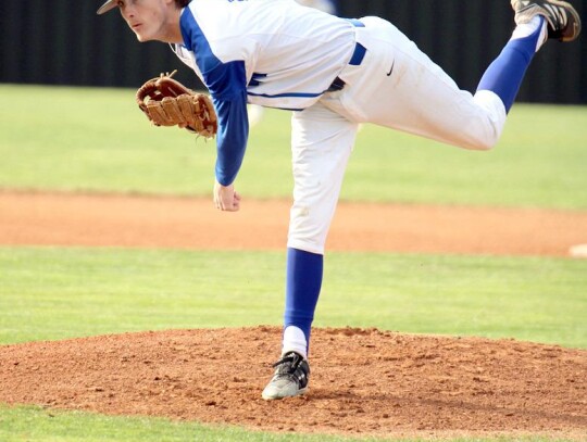 Senior lefty Josh Langford puts the ball into the strike zone for the Racers. • photo by Vickie Crossley