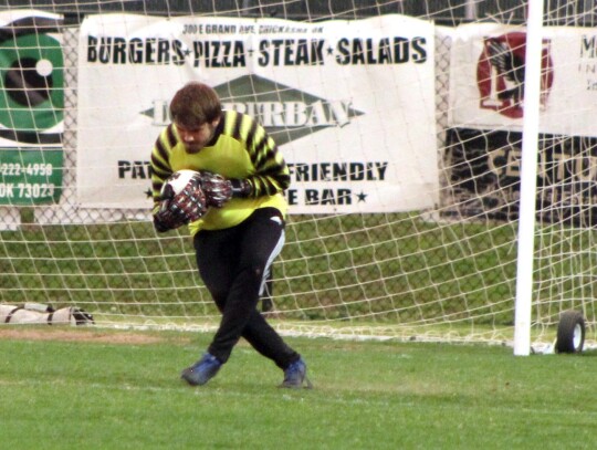 Sophomore goal keeper Cooper Hood nabs the ball for Newcastle to keep Chickasha from scoring during a game last week. • photo by Mindi Stucks