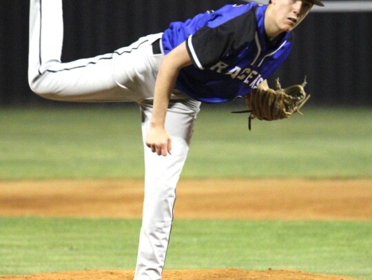 Jackson Robertson does some work from the pitcher’s mound during a recent Newcastle baseball game. • photo by Vickie Crossley