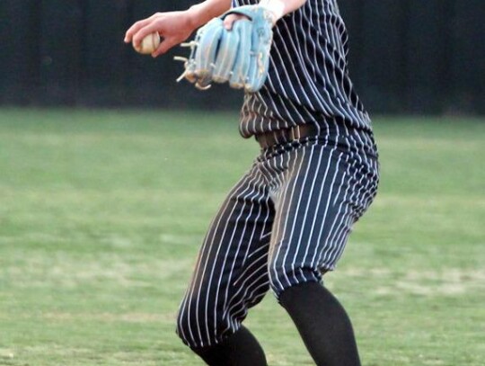 Jackson Schanuel makes the catch and looks for the play during the Bridge Creek game. • photo by Vickie Crossley