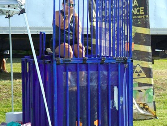 School Resource Officer Micah McNew taking her turn in the dunk tank at Newcastle’s Red, White &amp; Blue Fest.