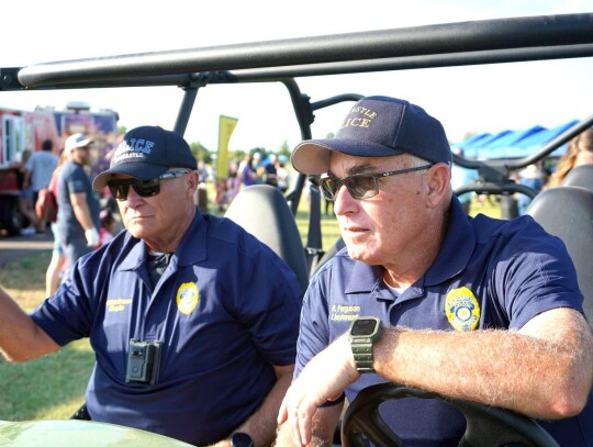 Police Lt. Ferguson and Chaplain Hutchinson make the rounds watching activity at Newcastle’s Red, White &amp; Blue Fest on Saturday, July 1 at Veterans Park.