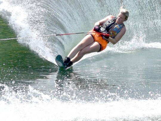 Newcastle resident Megan Allen shows the slalom skiing technique that qualified her for this year’s Water Ski Nationals. She holds the current State Women 2 (ages 25-34) Slalom Record, 2 buoys at 34 mph 35 feet off the towrope. • photo provided