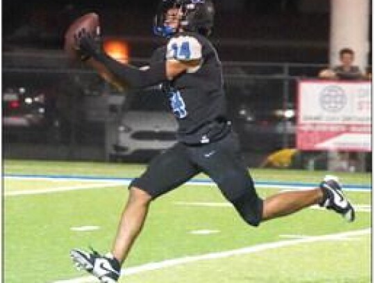 Jalen Lane makes the catch and then runs for the touchdown during the Friday night Newcastle-Tecumseh game. • photo by Jennifer Lewis