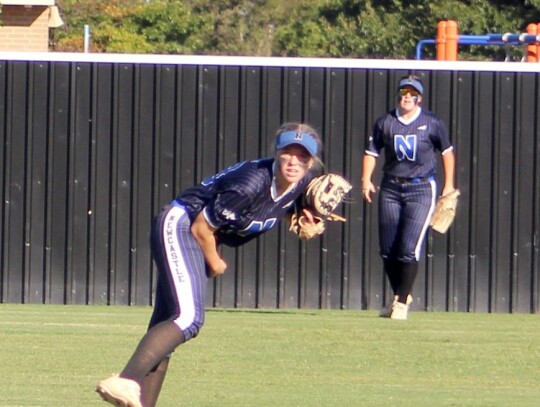 Newcastle’s Lexie Lovelace makes the throw home on a play during the Super Regional game last Thursday. The Racers beat Wagoner in two games to earn the right to go to the State Tournament. • photo by Lisa Smith-Longman