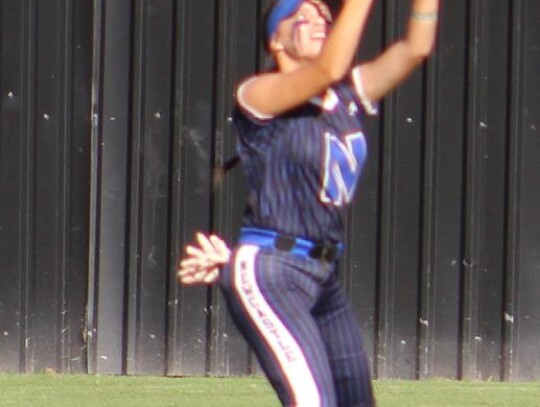 Madalyn Torrenueva makes the catch for the Racers during the Super Regional game. • photo by Lisa Smith-Longman