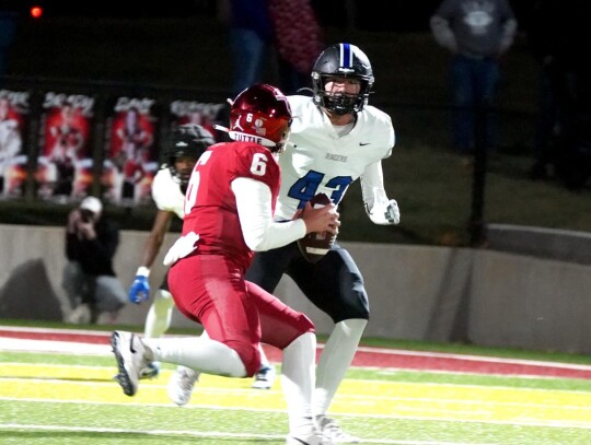 Ayden Elcyzyn stares down the Tuttle quarterback as he applies pressure for Newcastle during the Friday night game. • photo by Jennifer Lewis