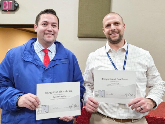 Ryan McLaughlin and Adam Hull were presented Recognition of Excellence awards from Newcastle Public Schools for having completed the National Institute for School Leadership program. • photo provided