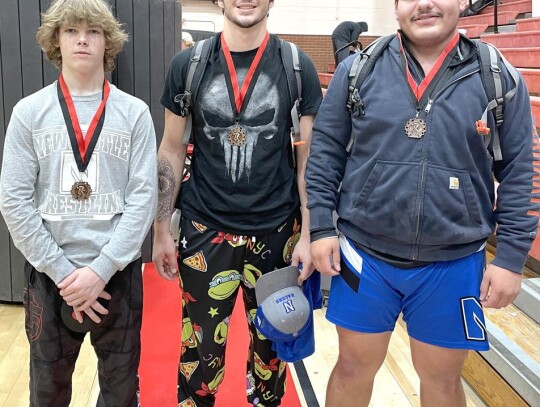 Racer wrestlers placing at the Duncan Southern Oklahoma Invitational tournament were: Gage Stark (123), 3rd; Shane Lovejoy (190), 3rd; and Nic Lozano (HW), 4th. Newcastle placed 10th overall as a team out of 24 schools which were participating. • photo 