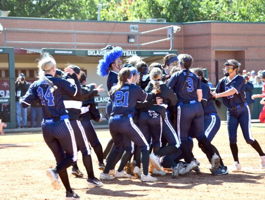 • file photo by Mark Codner A dominant year by the Newcastle Racer girls fast-pitch softball team resulted in bringing home a State Championship after their game against the Purcell Lady Dragons. The girls landed several athletes on post-season teams an