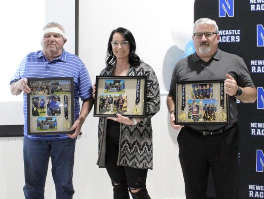 Racer Fast-Pitch Softball Coach Mike Crossley made shadow boxes to thank the following for their contribution over the years to the program; Buddy Eischen, Blythe Lyles, and Frank Strange.