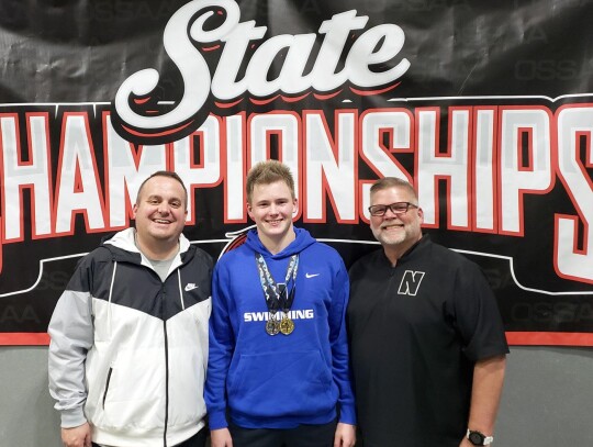 • photos by Jennifer Lewis Connor Leader, a sophomore at Newcastle High School and the only swimmer for NHS, was named State Champion after the Oklahoma Secondary School Athletic Association Class 5A 100m butterfly at the Jenks Aquatic Center Thursday a