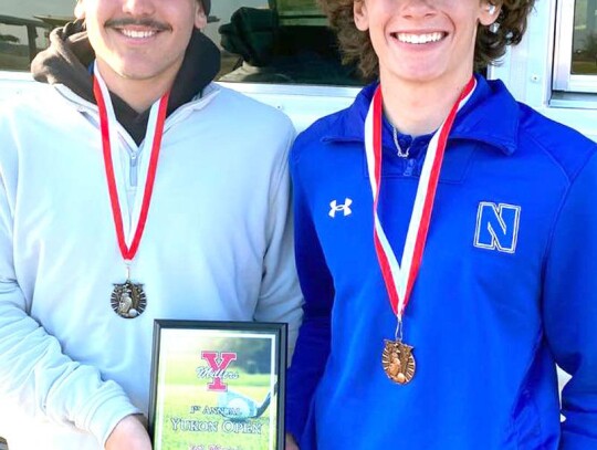 Newcastle’s Racer golf team placed first at the recently held Yukon Open. Racer golfers, from left, are: Cayden Viss, Mason Dobbs, Colton Bradley, Evan Goold, Coach Jeff Brickman, Grady Meek, Coach Keith Meek, Carson Black and Adam Snyder. Winning medal