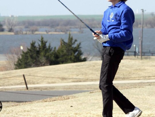 Mason Dobbs finishes a drive during recent play at Wintercreek Golf Course in Blanchard. • photo by Valerie Hobbs