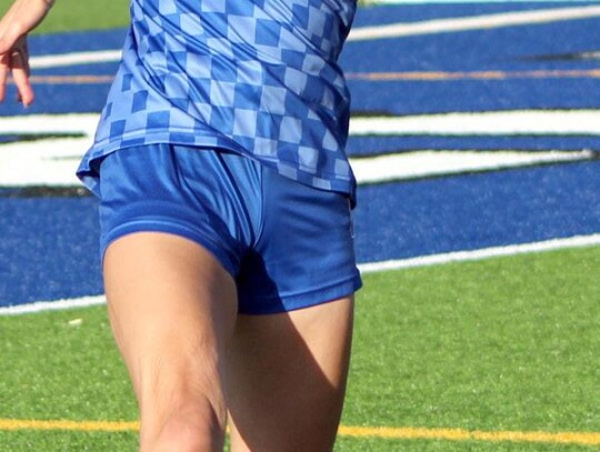 • photo by Mindi Stucks Senior Melia Stucks prepares to go around an opponent during a recent Racer girls’ soccer game.