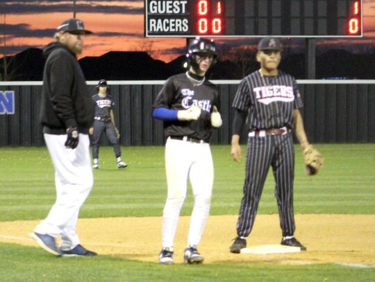 • photo by Lisa Longman-Smith Lane Seaton rounds third to take a look at his base-running options during a game pitting Newcastle against Ardmore.