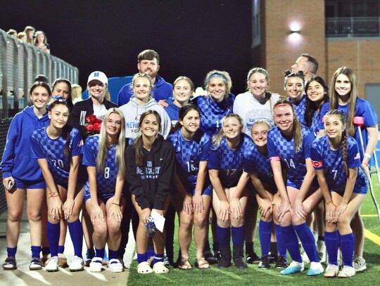 • photo by Mindi Stucks The Racer girls senior soccer players were celebrated on Senior Night. They are all in the front row: (from left) Candela Valverde, Madi Platte, Brynna Ford, Kaylin Holmes, Chloe Chmil, Carsyn Ray, Bentlee Lindsey, and Melia Stuc