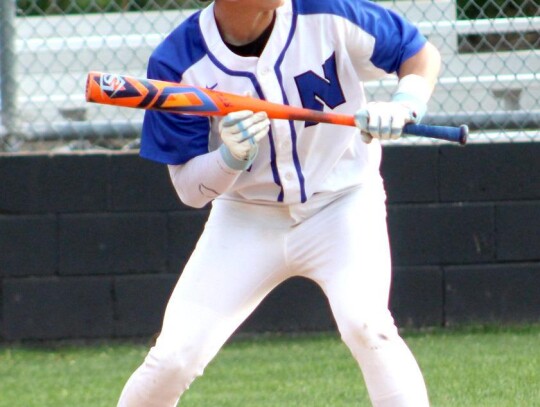 • photo by Lisa Longman Smith Austin Gibson prepares to lay down a bunt for the Racers baseball team.