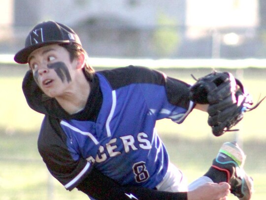 Kaden Longman finishes his pitch for Newcastle in the finals of the Regional Championship. • photo by Lisa Smith-Longman