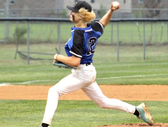 Ryder Gibson tosses one down the pipe in the Super Regionals game against Perkins-Tryon.