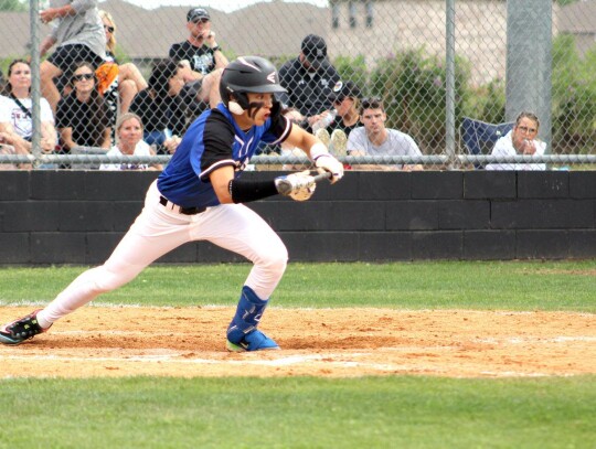 Kaden Longman lays down a bunt for the Newcastle Racers during the Super Regional victory last week against Perkins-Tryon.